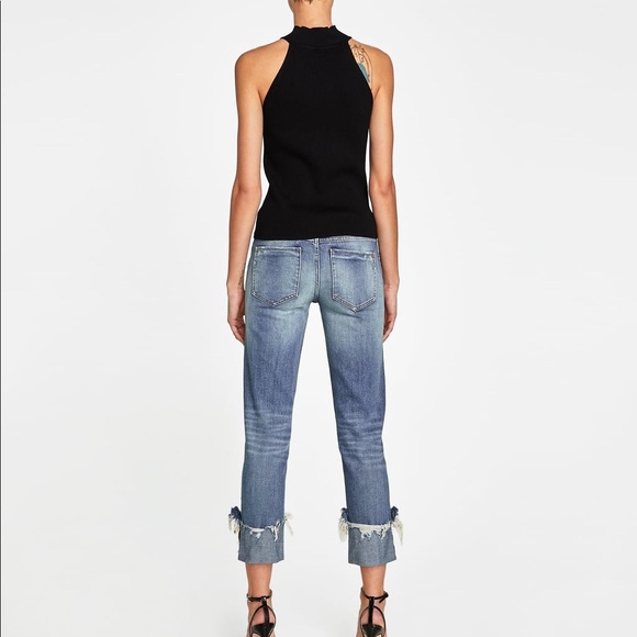 JEANS WITH UNEVEN HEMS AND PEARL BEADS - Picture 5 of 8